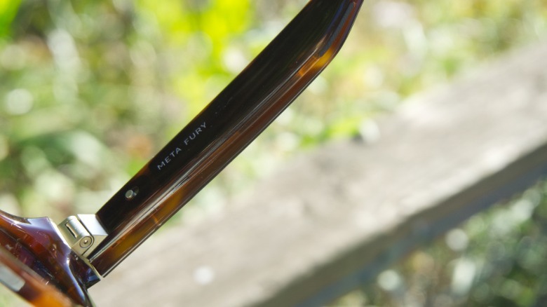 The inside arm of the Meta Glasses showing the power switch.